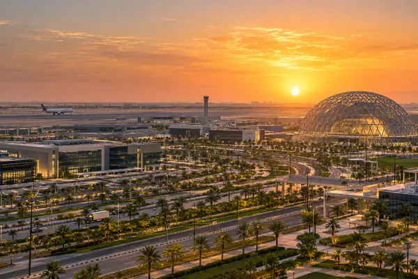 AI-generated illustration of Dubai South logistics and aviation district with a lattice dome at sunset