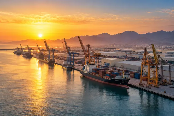 AI-generated illustration of the industrial port of Hamriyah Free Zone in Sharjah at sunrise