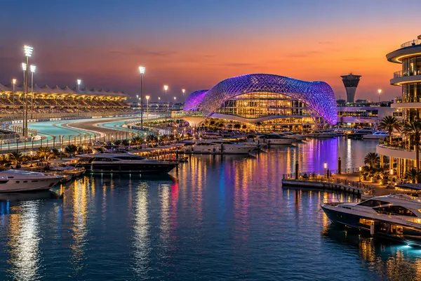 AI-generated illustration of the circuit and marina of Yas Island, Abu Dhabi, at dusk
